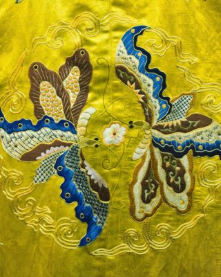 Embroidered collection – folded fabric and clothing