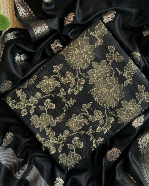 Black unstitched three-piece set with gold floral dupatta