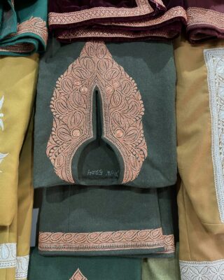 Embroidered collection – folded fabric and clothing